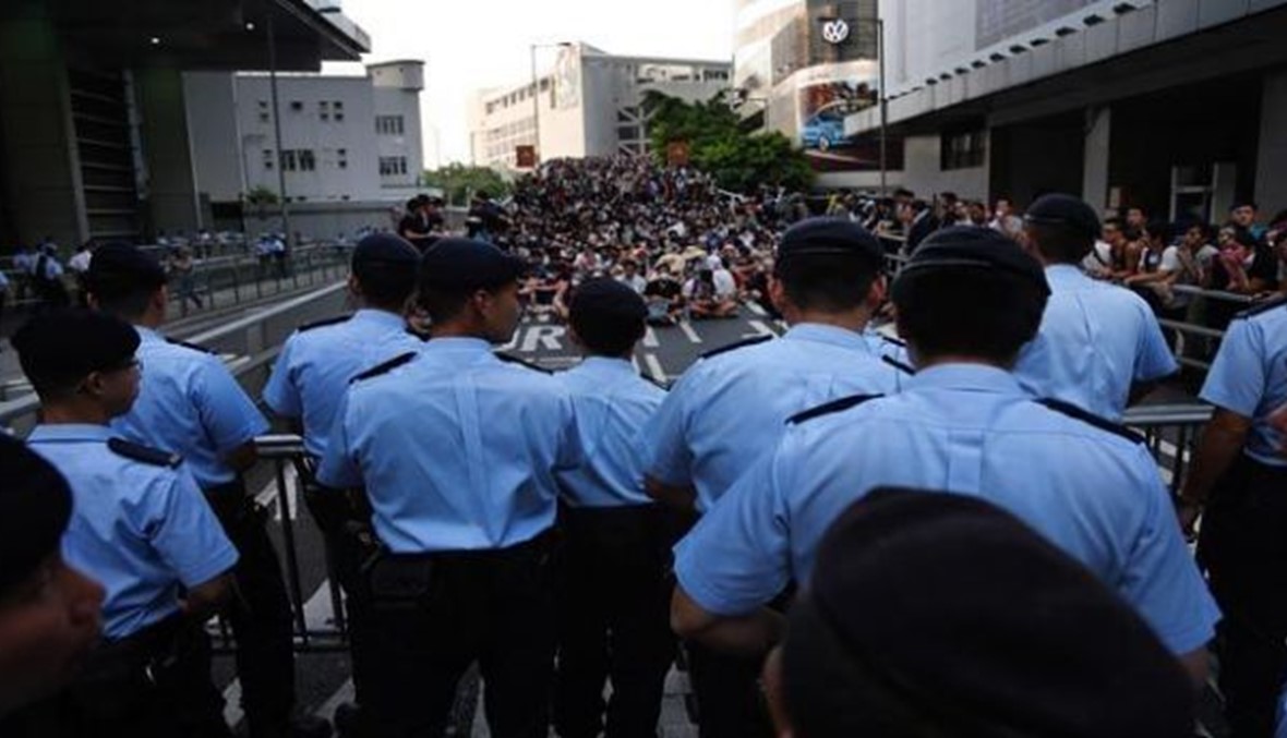 شوارع هونغ كونغ تعود الى "طبيعتها" بعد اجلاء المتظاهرين