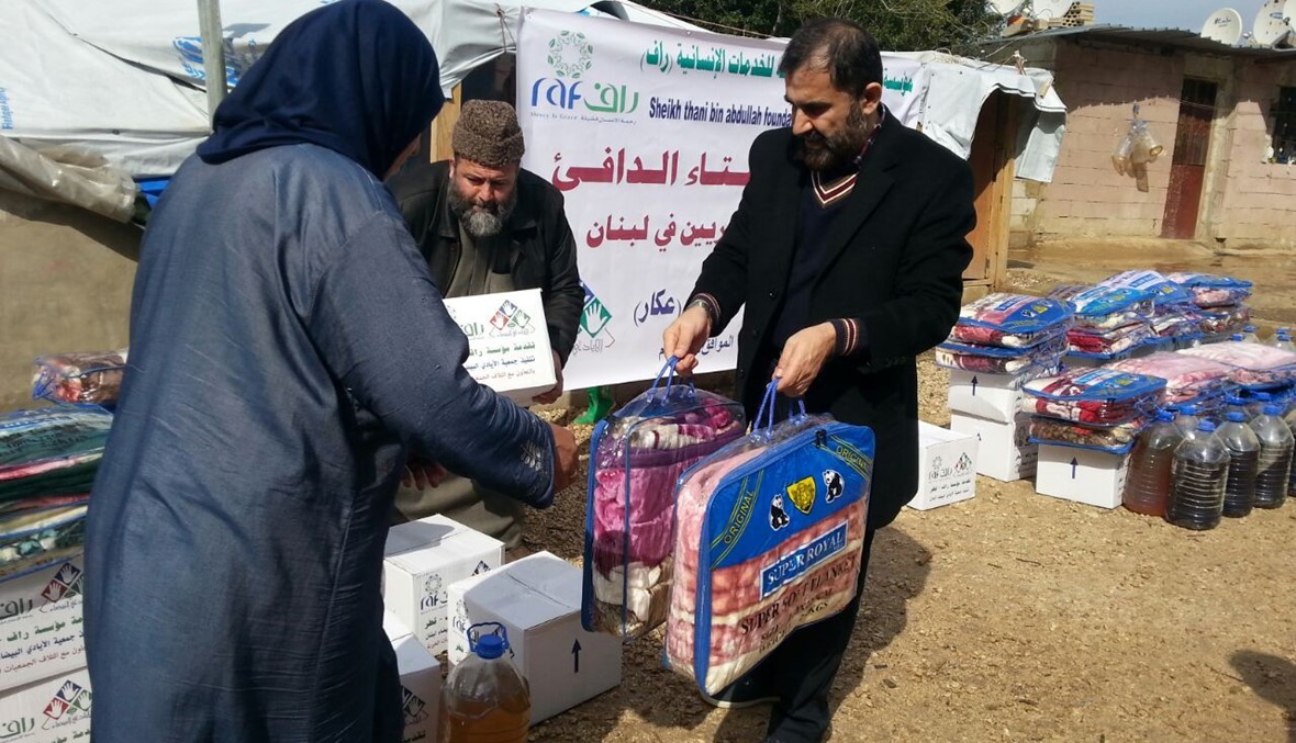 حصص غذائية ومازوت للنازحين السوريين في عكار - بالصور