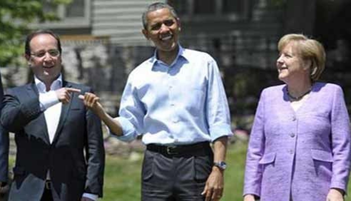 اوباما وميركل وهولاند يهددون برد فعل قوي في حال مخالفة اتفاق مينسك