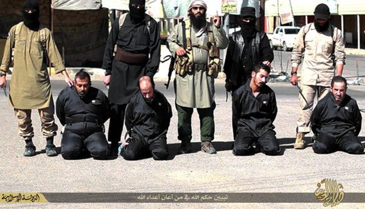 بالصور: "داعش" يعدم 4 من الحشد الشعبي في تكريت