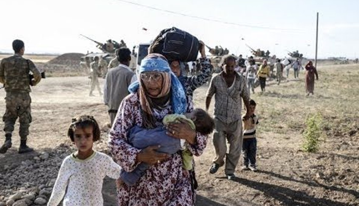 الفا لاجىء اضافي يعبرون الى تركيا بسبب المعارك  بين "داعش" والاكراد