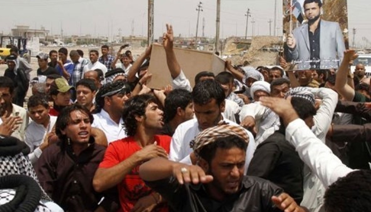 تشييع عراقي في البصرة قتل اثناء الدفاع عن مقام السيدة زينب قرب دمشق