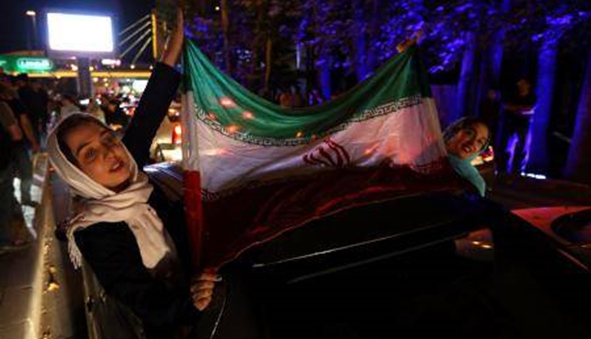 بالصور: الايرانيون ينزلون الى شوارع طهران للاحتفال بالاتفاق النووي