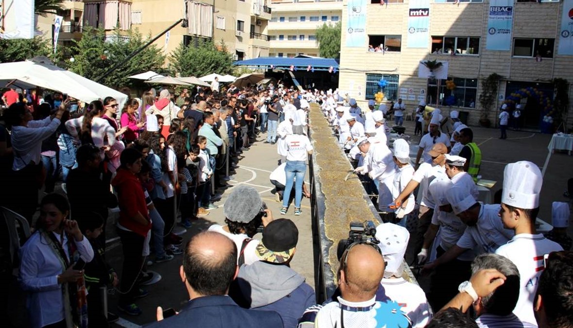 بالصور: هكذا نتحدّى الصعوبات... وأطول منقوشة في العالم لبنانية!
