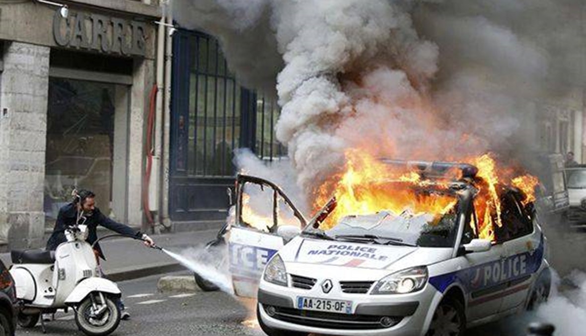 أميركي متهم بإحراق سيارة للشرطة الفرنسية في باريس