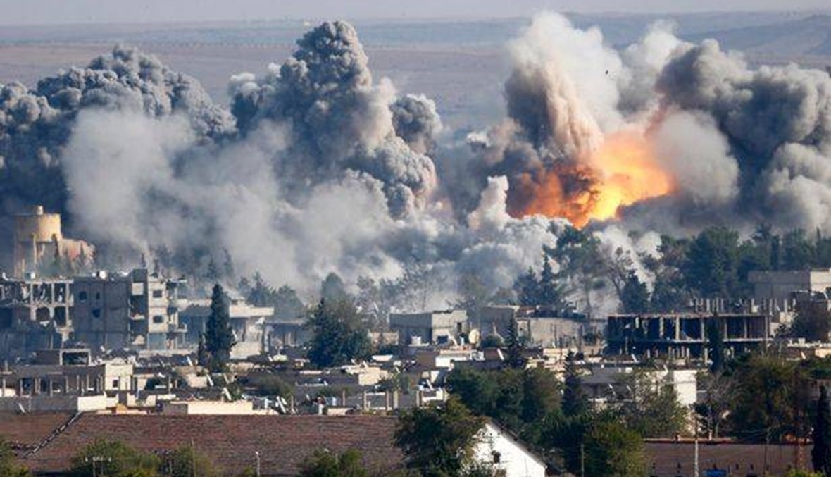 20 قتيلاً مدنياً بقصف لقوات النظام والتحالف الدولي في شمال سوريا