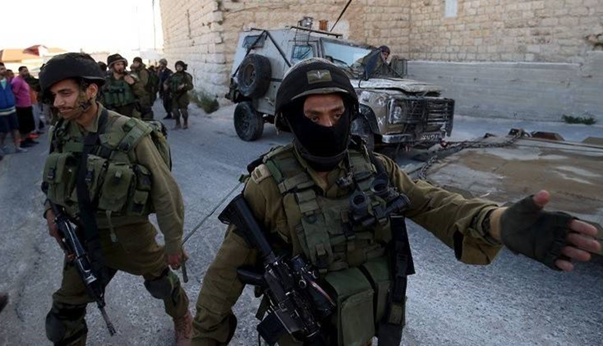 الشرطة الإسرائيلية تعتقل فلسطينياً يحمل عبوات