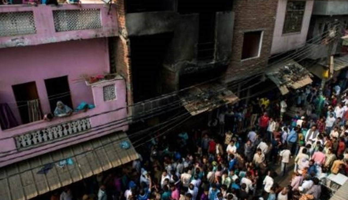 ماس كهربائي أو عقب سيجارة؟ 13 قتيلاً في حريق بمشغل للألبسة في الهند