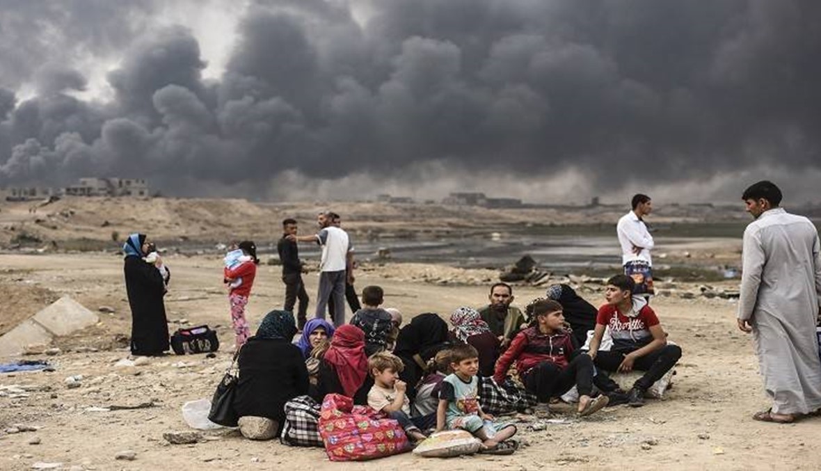 الفارون من الموصل يصفون مدينة الخوف: "والله سنموت من البرد"