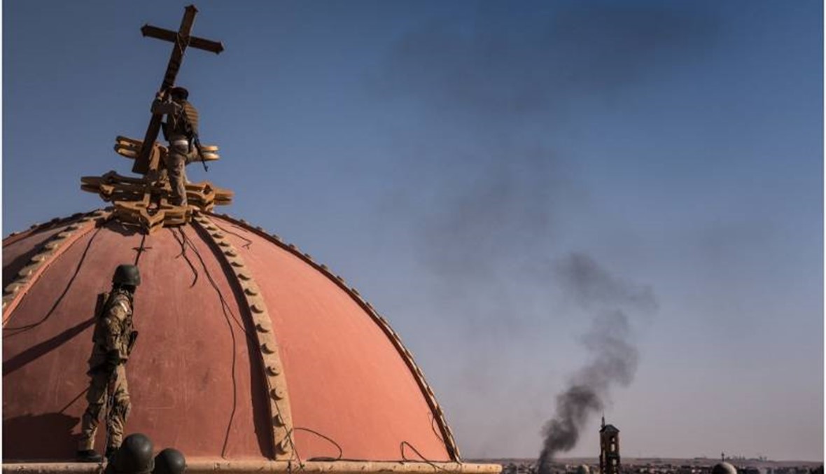 العراقيون المسيحيون يحتفلون بالميلاد على رجاء العودة الى بيوتهم