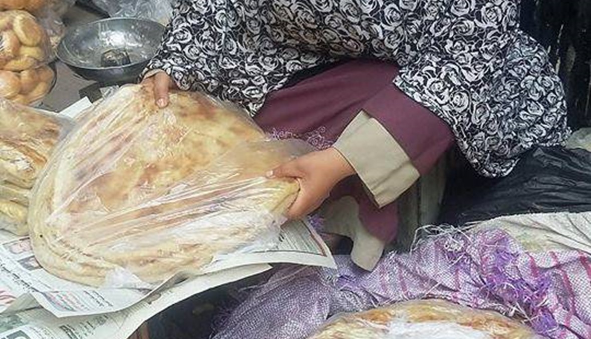 بالصور -  بائعة "فطير مشلتت" مصرية تتحدث عن طريقة إعداده