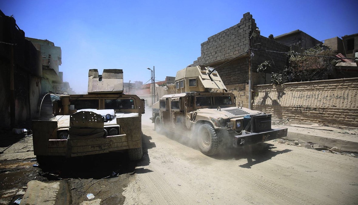 معركة الموصل في متاهة الأزقة  والجنود يعبرون من فتحات الجدران