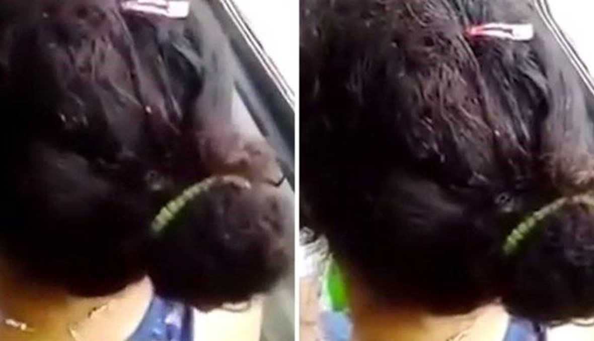 بالفيديو- رجل يصوّر رأس امرأة يملأه القمل!