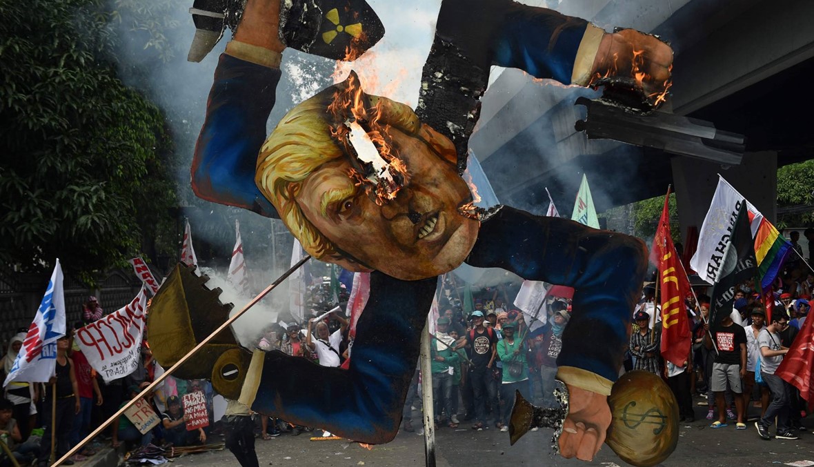تظاهرات ضدّ ترامب خلال مشاركته في قمة "آسيان" التي استضافتها الفيليبين (أ ف ب).