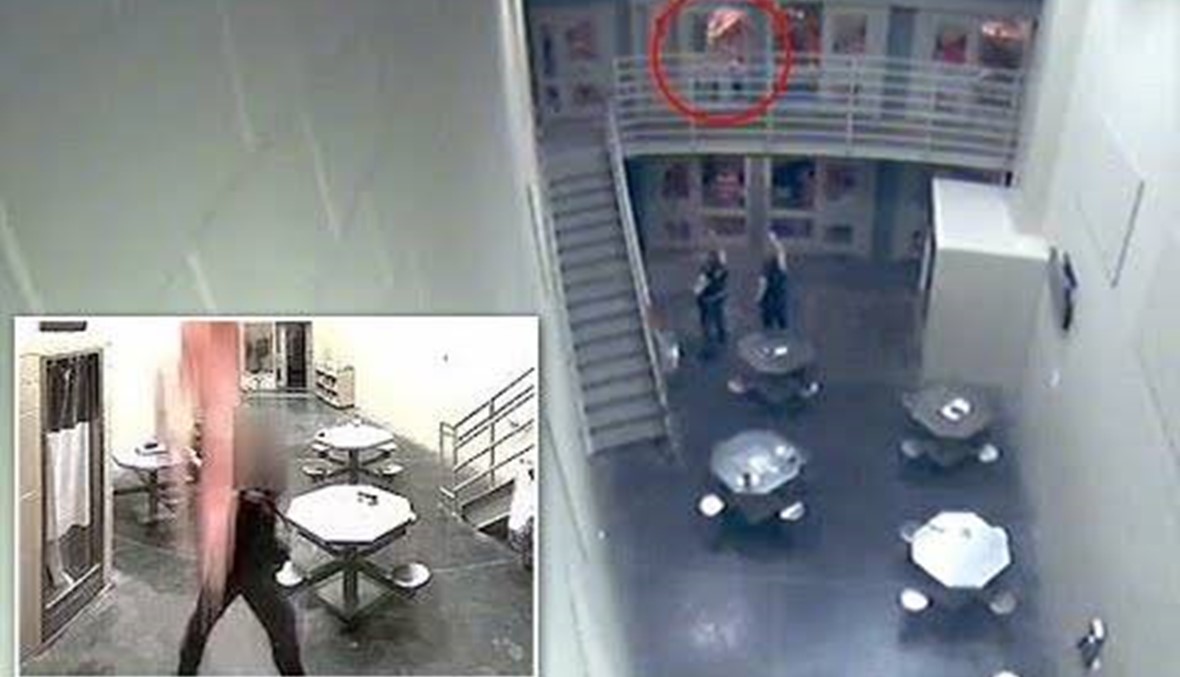 بالفيديو- حارس أمن يحبط محاولة انتحار سجين بعد قفزه!
