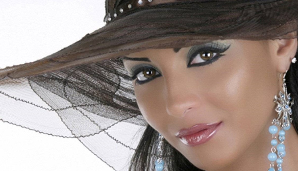 هل عادت دوللي شاهين لزوجها من جديد؟