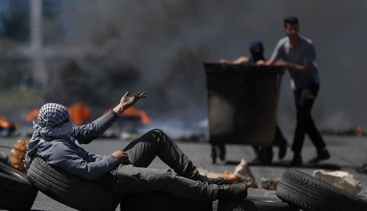 "جمعة الكاوتشوك"...3 ضحايا و250 جريحا فلسطينيا بمواجهات غزة (أ ف ب).
