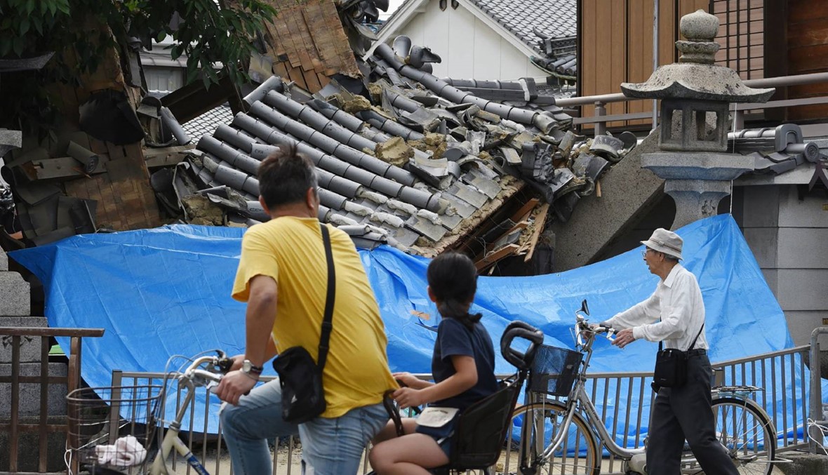 مقتل 3 اشخاص وإصابة المئات جراء زلزال ضرب منطقة أوساكا اليابانية (أ ف ب).