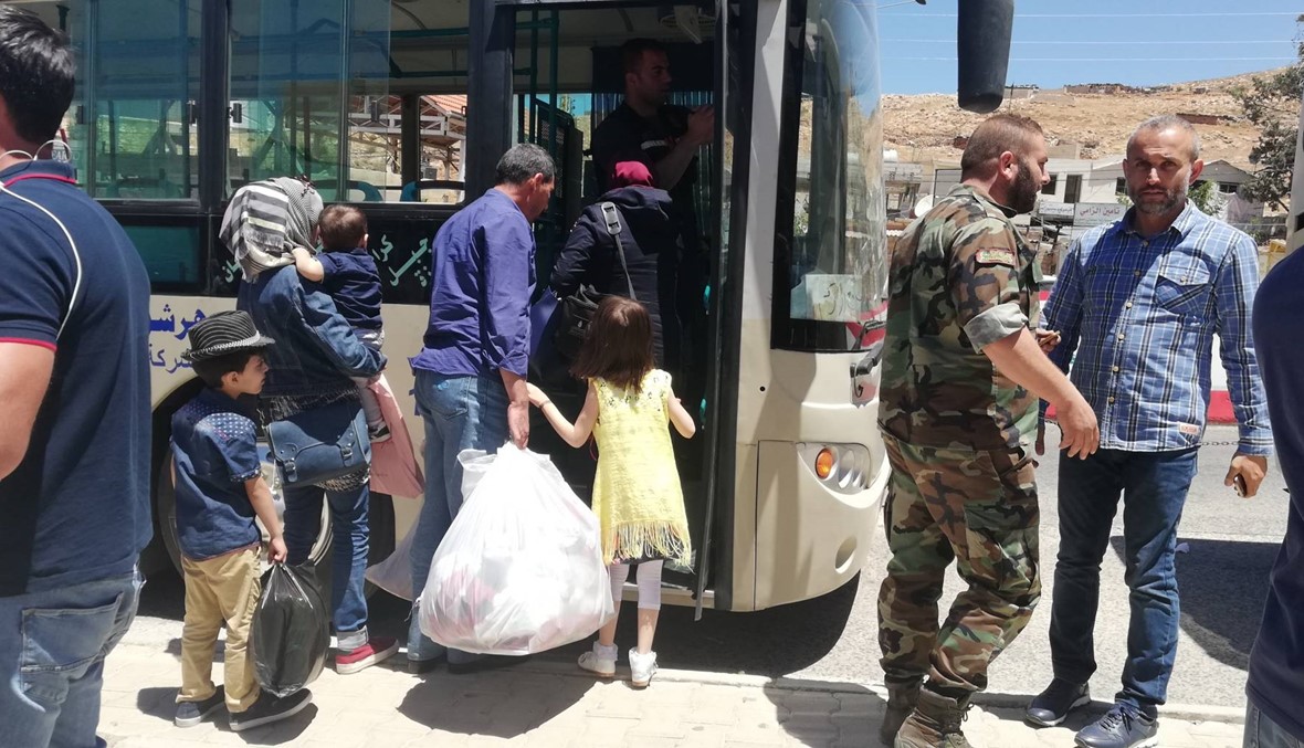 دفعة جديدة من 51 سورياً عادوا عبر المصنع إلى معضمية الشام