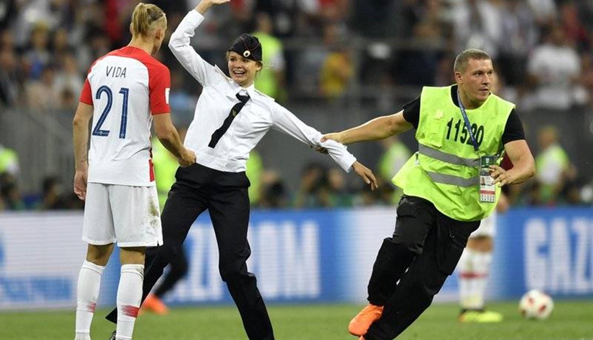 Pussy Riot upstages Putin with protest that halts World Cup