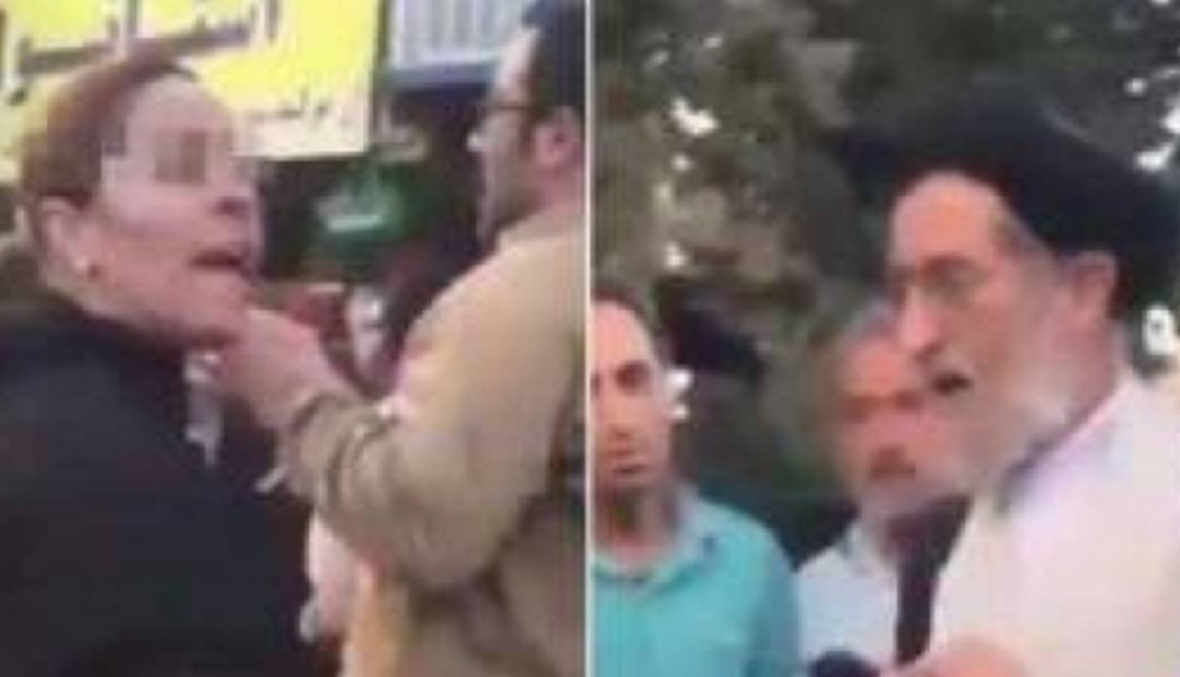 بالفيديو- امرأة إيرانية تخلع حجابها أمام شيخ بعدما هدّدها بالسجن إذا لم تصلحه