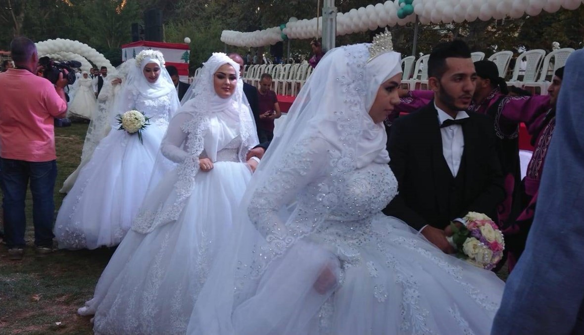 بالصور... عرس جماعي في بعلبك يجمع 116 عريسا وعروسا