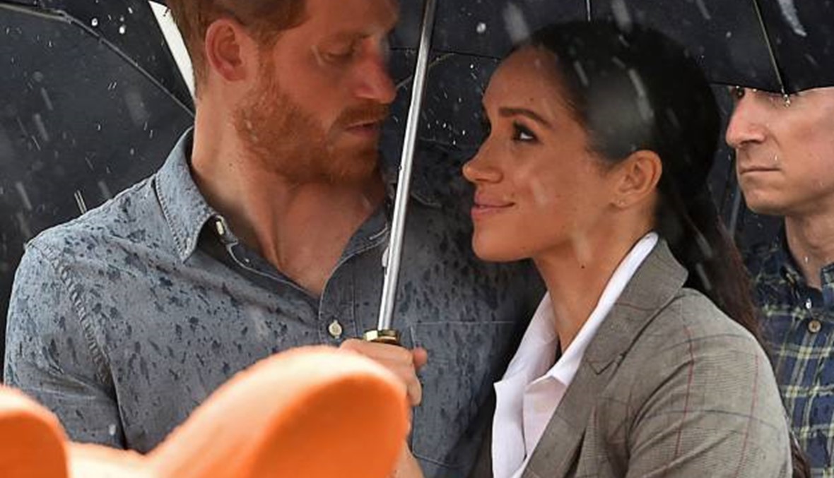 الأمير هاري وميغان ماركل تحت زخّات المطر... نظرات وابتسامة (صور وفيديو)