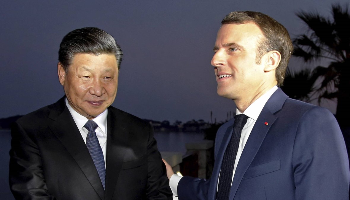 ماكرون يسعى للحد من الطموحات الصينية مع استقباله شي جينبينغ في باريس