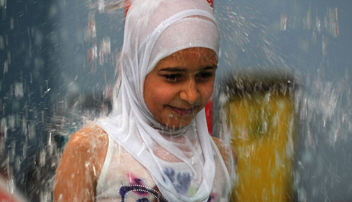 بالصور: صيف حار عراقي ينذر بكارثة انسانية