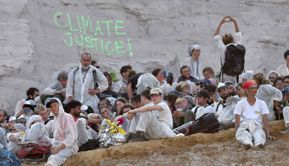 ناشطون بيئيون يقتحمون منجماً للفحم في ألمانيا (صور)