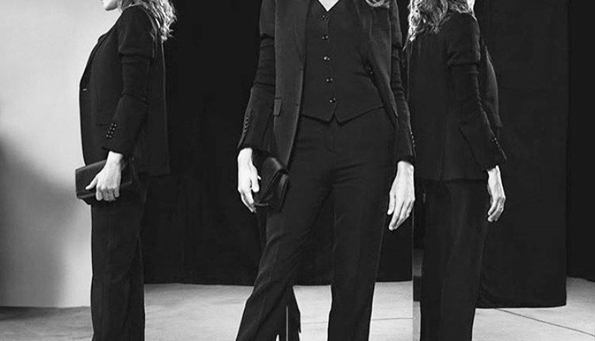 كارلا بروني ساركوزي سحرت الحضور في عرض أزياء بوربري في لندن