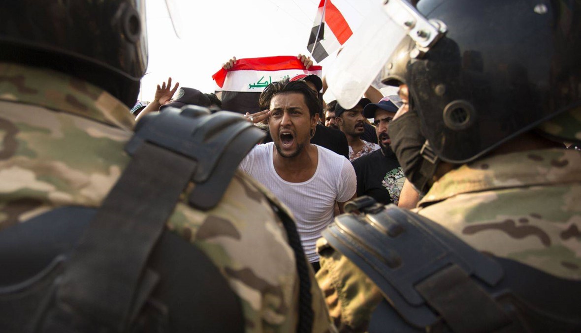 القوات العراقية تصد المتظاهرين وتستعيد ثلاثة جسور في بغداد