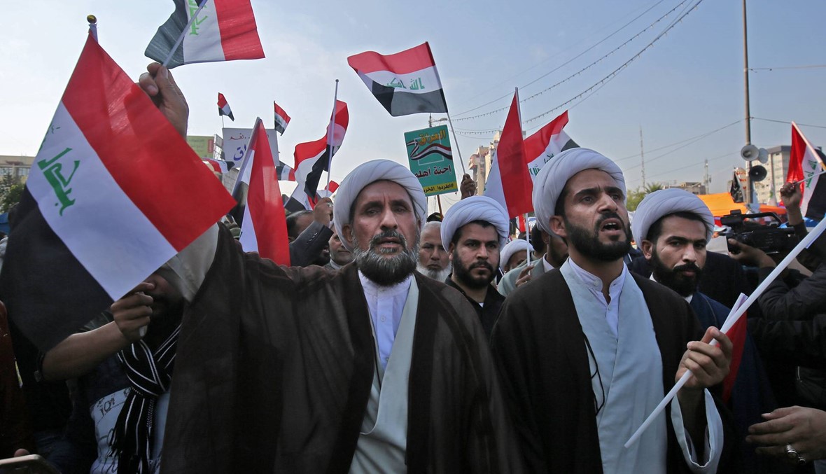 العراق: آلاف من أنصار "الحشد الشعبي" ينظّمون مسيرة في ساحة التحرير ببغداد