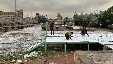 Iraqis wake up to snow for first time in over a decade