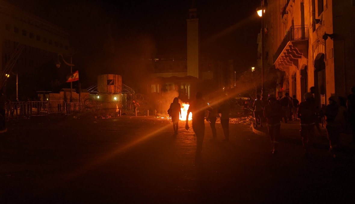 Hundreds of protestors gather in front of parliament to demand the resignation of government