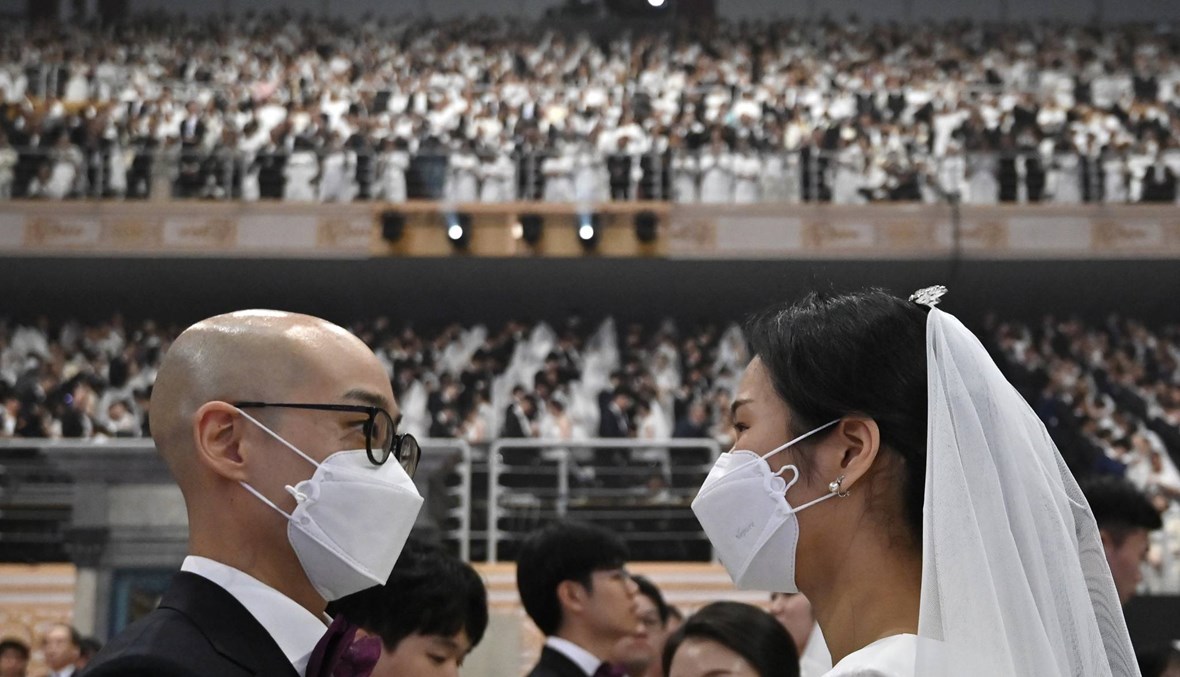 مراسم "بحماية الله"... زواج جماعي في كوريا يتحدّى فيروس كورونا المستجدّ