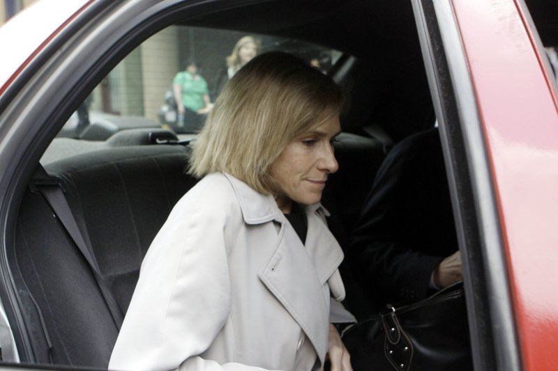 FILE - In this May 15, 2009, then-acting U.S. Attorney Nora Dannehy leaves law offices in Washington. Dannehy, a federal prosecutor who was helping lead the investigation into the origins of the Trump-Russia probe has resigned from the Justice Department. (AP Photo)