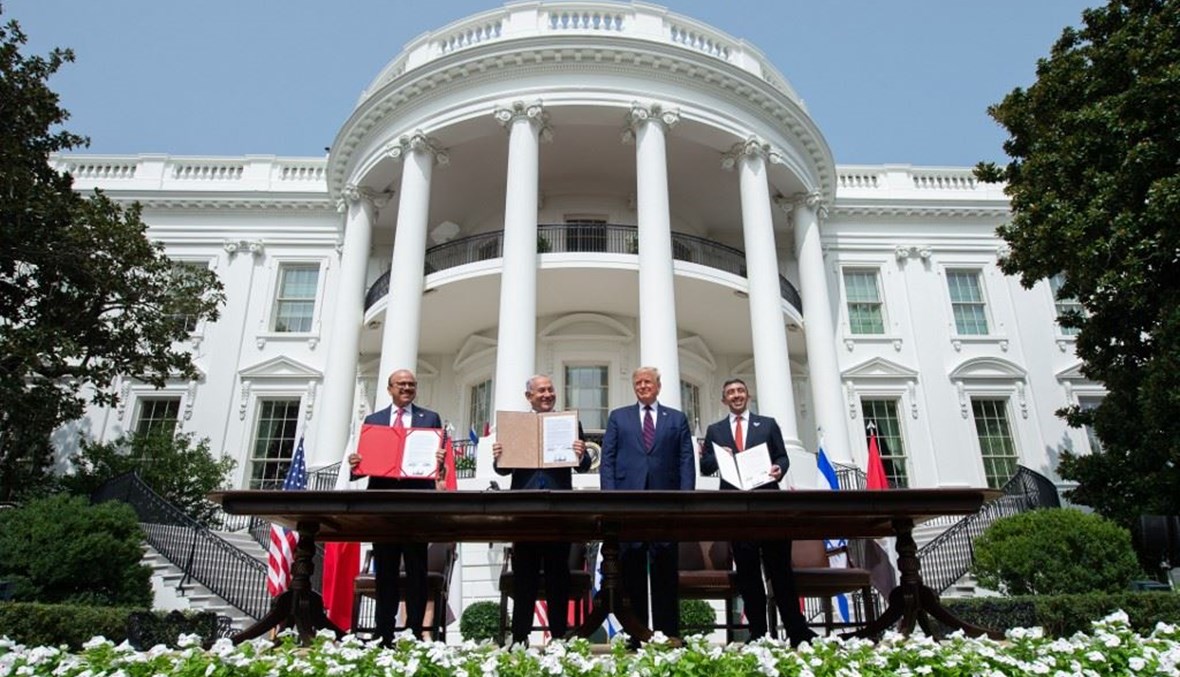 خلال توقيع اتفاق التطبيع في البيت الأبيض (أ ف ب).