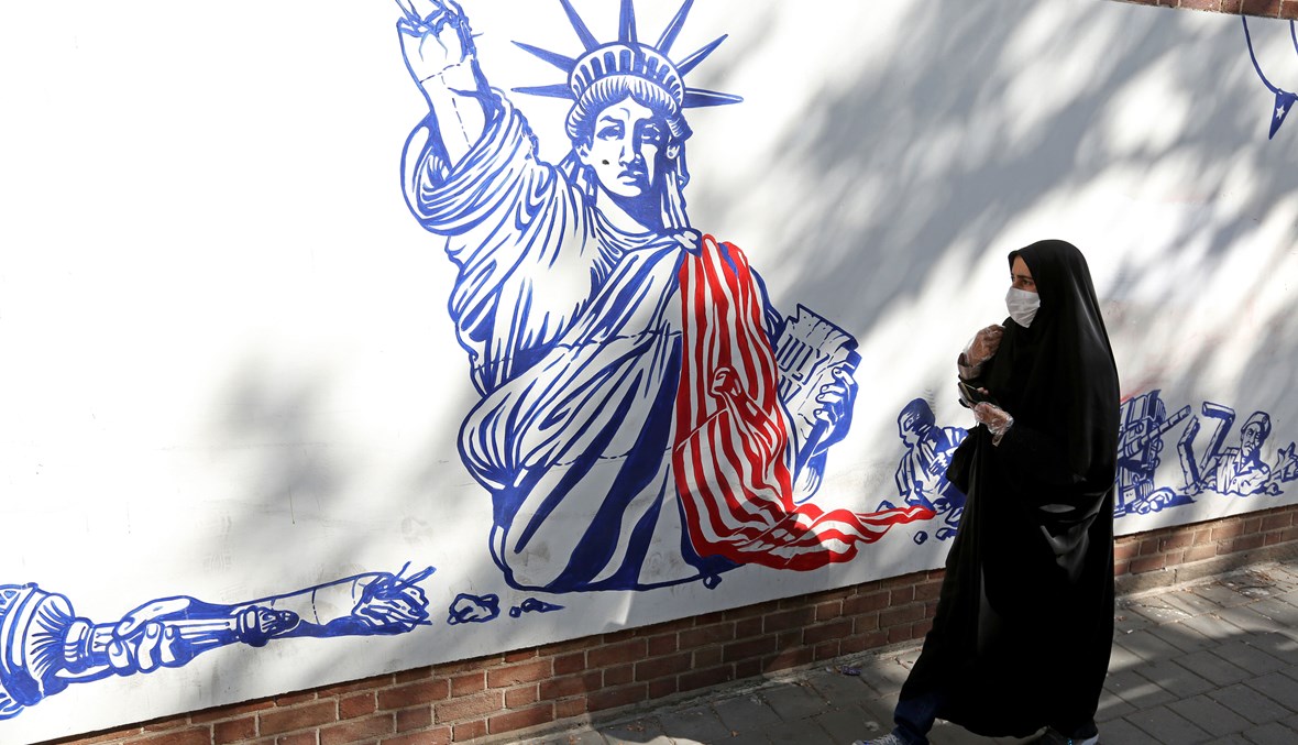 جدارية مناهضة لسياسات الولايات المتحدة في الشرق الأوسط، في طهران (تعبيرية- أ ف ب).
