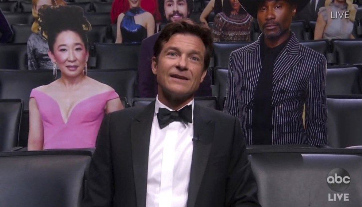 Jason Bateman appears in the audience surrounded by cardboard cutouts during the 72nd Emmy Awards broadcast, on Sept. 20, 2020. (AP Photo)