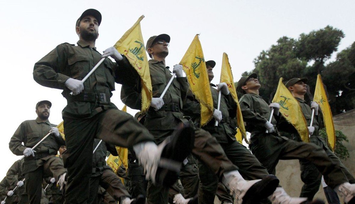  Hezbollah fighters parade during the inauguration of a new cemetery for their fighters who died in fighting against Israel, in a southern suburb of Beirut, Lebanon. (AP Photo)