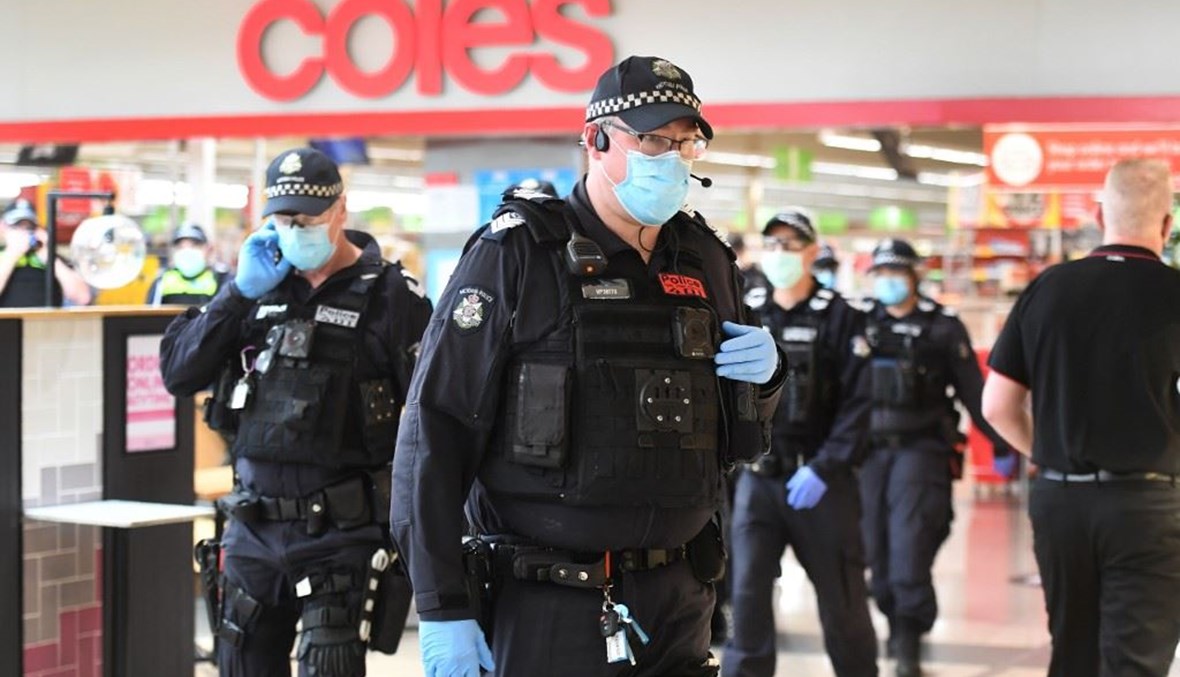الشرطة الأوسترالية تطبّق الإجراءات الوقائية (أ ف ب).