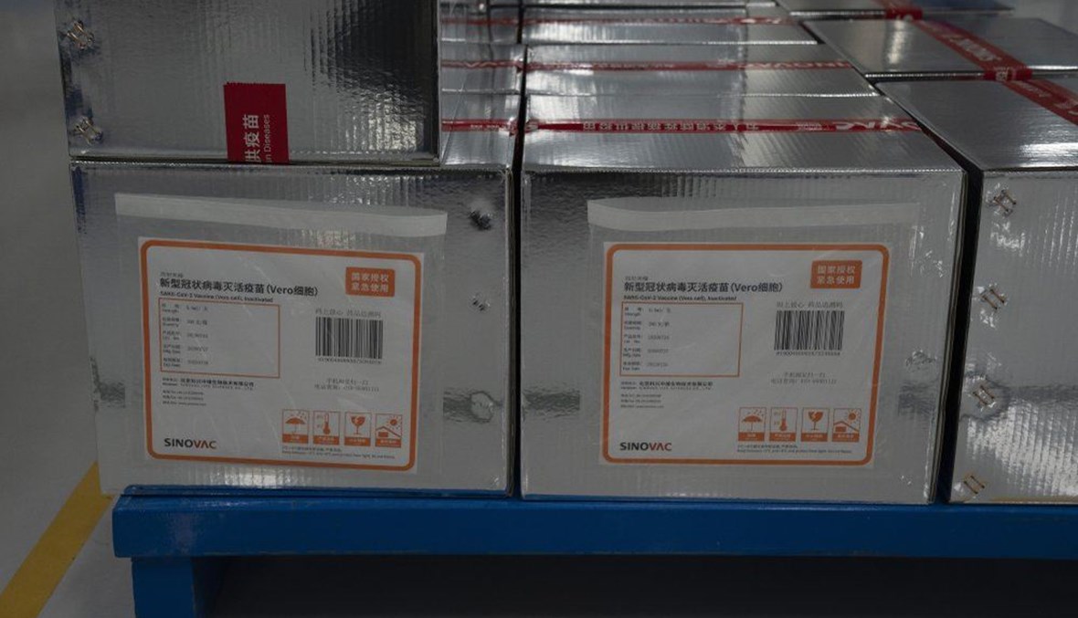 Boxes of SARS CoV-2 Vaccine for COVID-19 stamped with the words "State Authorized, Emergency Use" produced by SinoVac are stacked at its factory in Beijing on Thursday, Sept. 24, 2020. (AP Photo)
