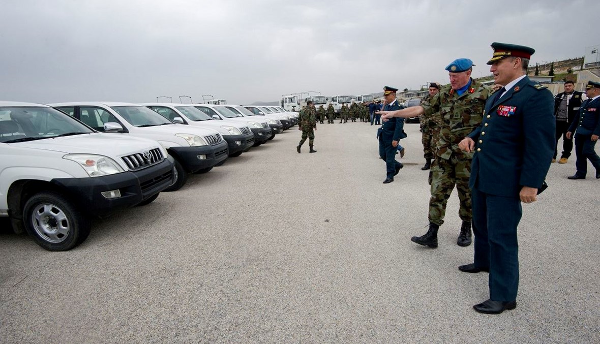 UNIFIL Head of Mission and Force Commander Major General Michael Beary shows LAF Deputy Chief of Staff Brigadier General Janbay some of the 62 vehicles UNIFIL is donating to the LAF and the LAF Intelligence. (UNIFIL)