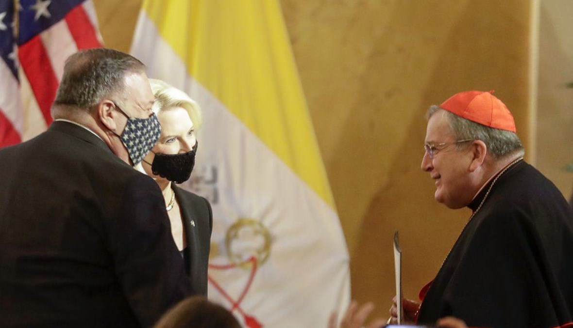 U.S. Secretary of State Mike Pompeo, left, and U.S. Ambassador to the Holy See Callista Gingrich greet Cardinal Raymond Burke. (AP Photo)