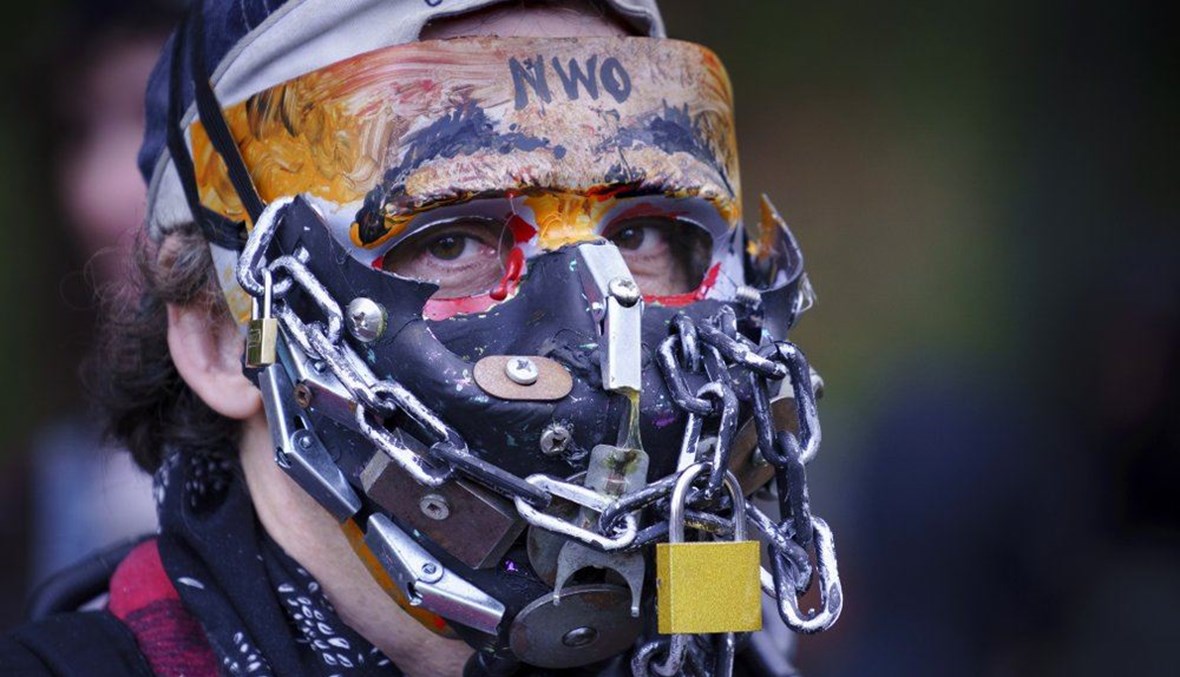 A man takes part in an anti-mask rally during the coronavirus pandemic in Montreal, on Wednesday, Sept. 30, 2020. (AP Photo)