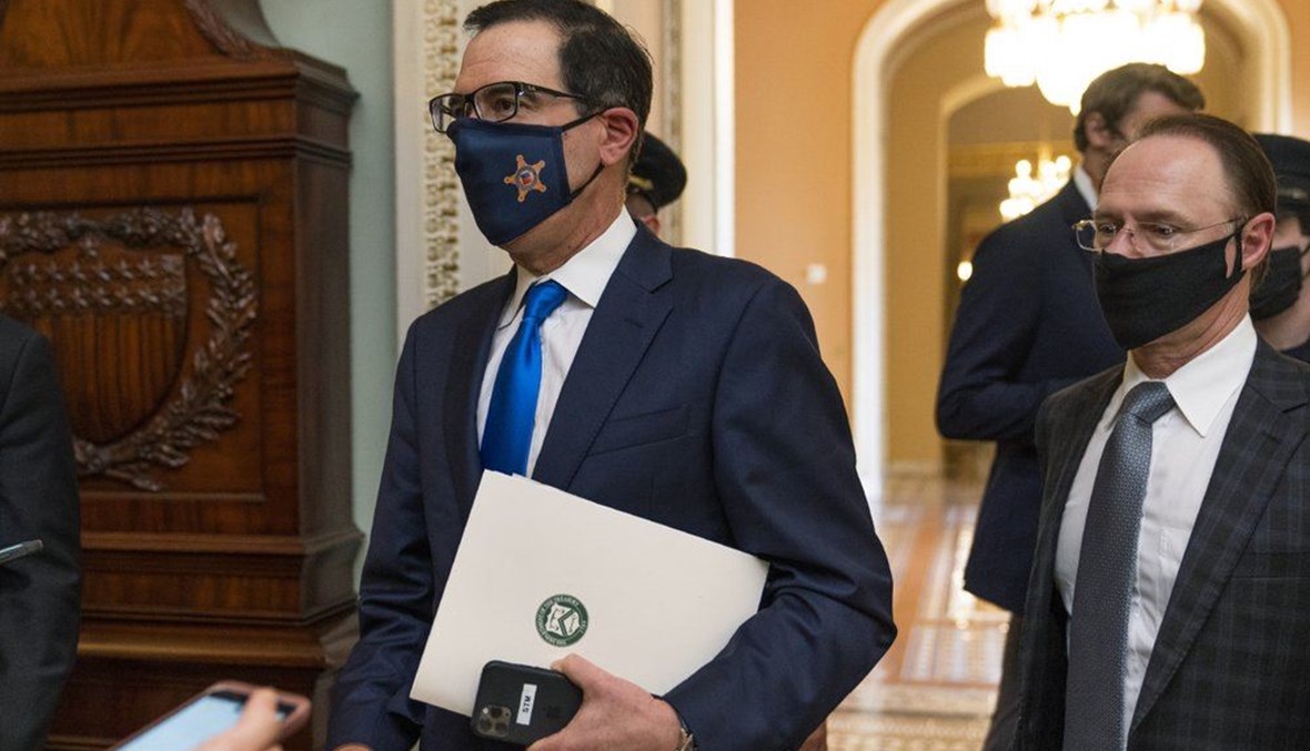 Treasury Secretary Steven Mnuchin, makes a brief comment as he leaves the Capitol. (AP Photo)