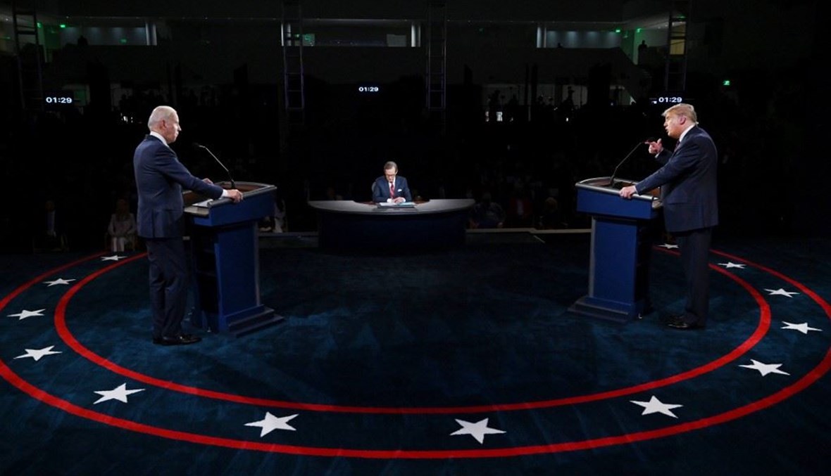 ترامب وبايدة خلال مناظرة تلفزيونية (أ ف ب).