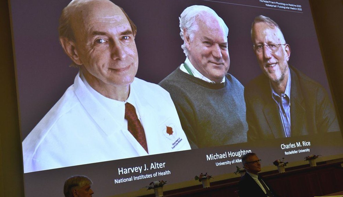 The 2020 Nobel laureates in Physiology or Medicine are announced during a news conference at the Karolinska Institute in Stockholm, Sweden, Monday Oct. 5, 2020. (AP Photo)
