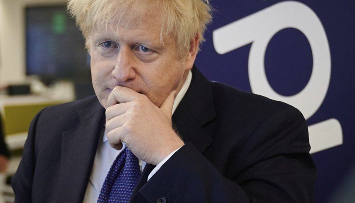 Britain's Prime Minister Boris Johnson visits the headquarters of Octopus Energy in London, Monday Oct. 5, 2020. (AP Photo)